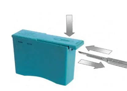 Esthetician safely removing a used dermaplaning blade with a blue surgical blade remover box during professional skincare treatment.