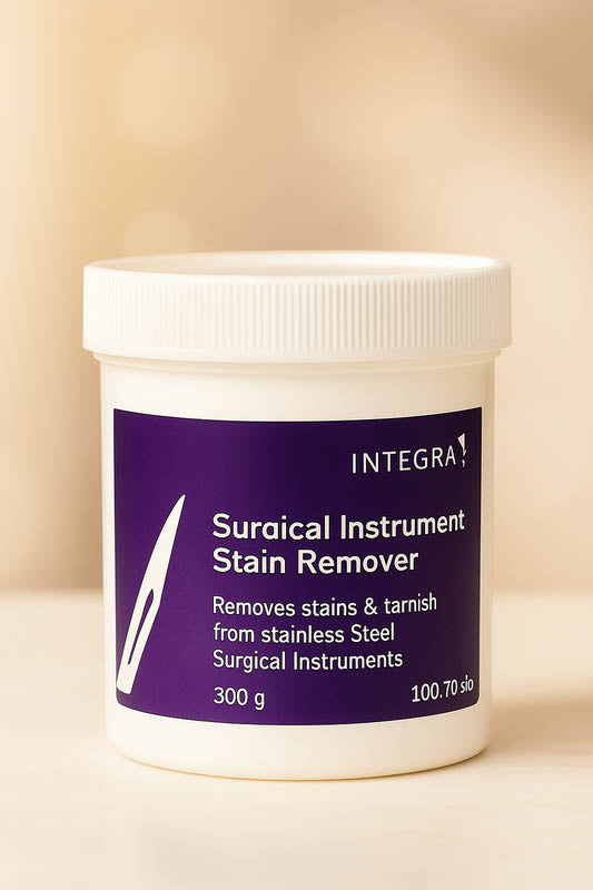 Luxury product mockup of Integra Surgical Instrument Stain Remover displayed on a white marble spa counter with a soft beige background, professional lighting, and minimalist packaging