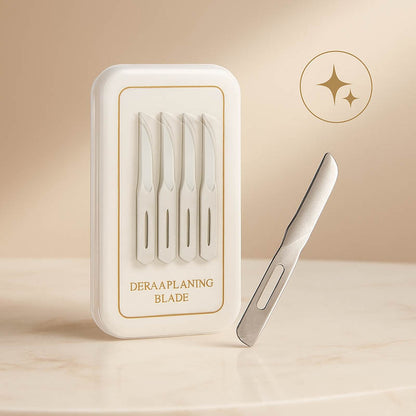 Premium dermaplaning blades displayed on a blush-toned marble surface with soft lighting and gold accents, evoking elegance and high-end skincare tools for professional estheticians.