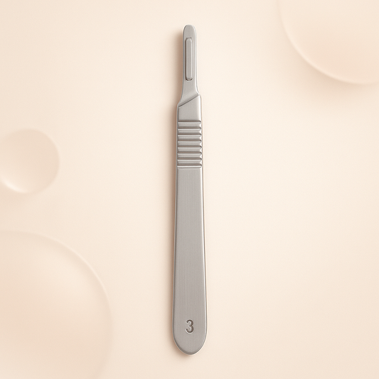 Luxury #3 stainless steel dermaplaning handle displayed on a soft blush background — engraved with “3” near the base, featuring a polished, ergonomic design ideal for estheticians and professional skincare treatments, styled for high-end Shopify product listings.