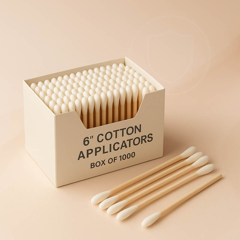 Close-up of a box of 1000 six-inch cotton tipped applicators used by estheticians for skincare treatments, displayed on a clean neutral background with soft lighting to emphasize quality and hygiene.