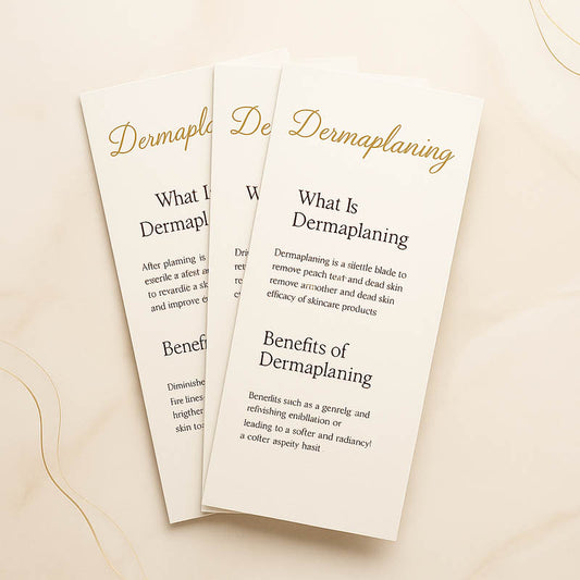 Elegant dermaplaning rack cards for estheticians, featuring luxury gold and blush design highlighting ‘What Is Dermaplaning’ and ‘Benefits of Dermaplaning,’ displayed on a marble background