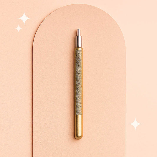 Luxury dermaplaning mini handle for estheticians displayed on a soft champagne satin background — polished stainless steel design with ergonomic grip, professional-grade tool ideal for precision skincare and spa treatments, optimized for high-end Shopify product listings.