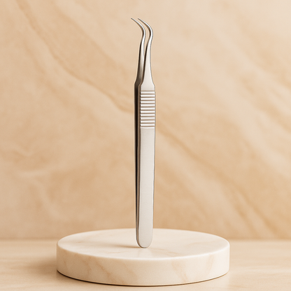 Professional stainless steel pimple popper and blackhead tweezers displayed on a soft beige marble surface with luxury spa lighting, high-end skincare tool for estheticians